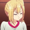 Anime girl with blonde hair pouting with puffed cheeks and closed eyes.