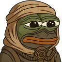 A green frog character wearing a tan head wrap and a respirator mask with a tired expression.