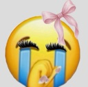 Yellow crying emoji with long black eyelashes and a pink bow on its head.