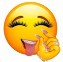 A yellow smiley face with long eyelashes, metal braces, and a hand making a pinch gesture.