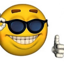 Yellow smiley face wearing black sunglasses and giving a thumbs up gesture.
