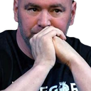 Dana White resting his chin on his clasped hands with a serious and skeptical expression.