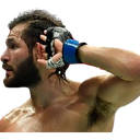 Jorge Masvidal with a confused expression touching his ear while wearing MMA gloves.