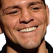 A man with a wide, smug grin and visible teeth.