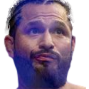 A man with a beard and braids looking to the side with a skeptical and unimpressed expression.