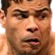 Man with a furrowed brow and mouth slightly open looking skeptical and confused.