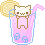 A small white cat with a happy face sitting inside a glass of pink liquid with a lemon slice and ice cubes.