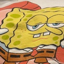 SpongeBob SquarePants looking sideways with a suspicious and judgmental expression.
