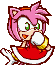 Pink hedgehog character with a mischievous expression giggling with a hand near their mouth.