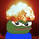 A green frog character with a large fiery explosion erupting from its head.