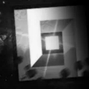 A glowing square portal shines brightly against a dark, abstract background.