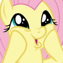 Fluttershy with wide sparkling eyes and hands pressed to her cheeks in a gesture of excitement.