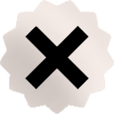 Black X mark centered on a white scalloped badge.