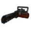 A tiny pixelated character standing next to a large, dark mechanical tool.