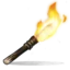 A pixelated handheld torch with a bright yellow flame burning against a dark background.