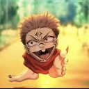 A distorted chibi character with a manic grin lunging forward against a blurry orange background.