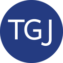 Letters TGJ displayed in white sans-serif font inside a solid blue circle.