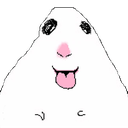 A white creature with large dark eyes and a pink tongue sticking out in a silly expression.