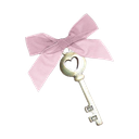 A white key with a large pink bow tied around its handle.