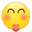 Smiley face with closed eyes and a pink tongue sticking out.