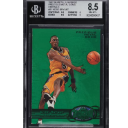 Basketball player in a yellow jersey on a green trading card encased in a protective slab.