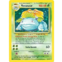 Trading card featuring a large blue monster with a plant on its back.