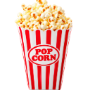 A red and white striped bucket filled with fluffy yellow popcorn.