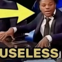 A man in a suit gestures towards a large yellow arrow pointing at the word USELESS.