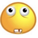 Yellow smiley face with wide, staring eyes and a single buck tooth showing a confused expression.