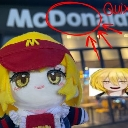 A yellow-haired plush toy wearing a red cap stands in front of a fast food restaurant storefront.