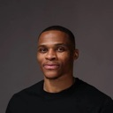Russell Westbrook looking directly at the camera with a neutral, unamused expression.