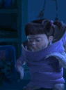 Boo from Monsters Inc. wearing a purple monster suit, transitioning from a calm expression to an intense, open-mouthed scr...