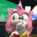 Amy Rose covering her mouth with her hands in a gesture of surprise.