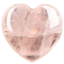 A polished, translucent pink crystal carved into a heart shape.