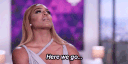 Woman rolling her eyes with the text caption Here we go.