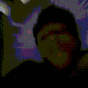 A person making a series of intense, distorted facial expressions in a four-panel, low-quality image.