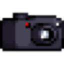 Camera with a black body, a lens, and a small red light.