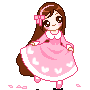 A girl with long brown hair wearing a pink dress twirls while pink petals fall around her.