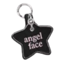 A black star-shaped keychain with the words angel face written in white text, hanging from a silver metal ring.