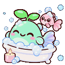 A small green creature with a sprout on its head sits in a bathtub full of bubbles with a small pink fish nearby.