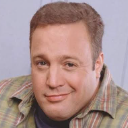 Kevin James making a subtle, smug smirk with a knowing expression.