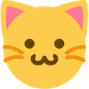 A yellow cat face with pink ears, brown eyes, and a brown w-shaped mouth.