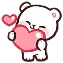 A small white bear with a happy expression holding a large pink heart with a smaller heart floating nearby.