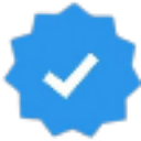A blue star-shaped badge containing a white checkmark in the center.