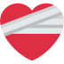 Red heart wrapped in white medical bandages.