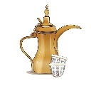 A golden traditional Arabic dallah coffee pot standing next to a small patterned coffee cup.