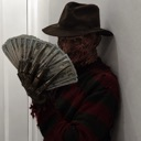 Freddy Krueger wearing his signature fedora holds a large fan of cash in front of his face with a sinister expression.