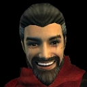 A man with a dark beard and hair wearing a red garment, smiling with a smug expression against a black background.