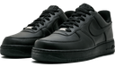 A pair of black low-top sneakers angled towards the viewer.