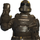 A soldier in dark tactical armor and a helmet gives a thumbs-up gesture.